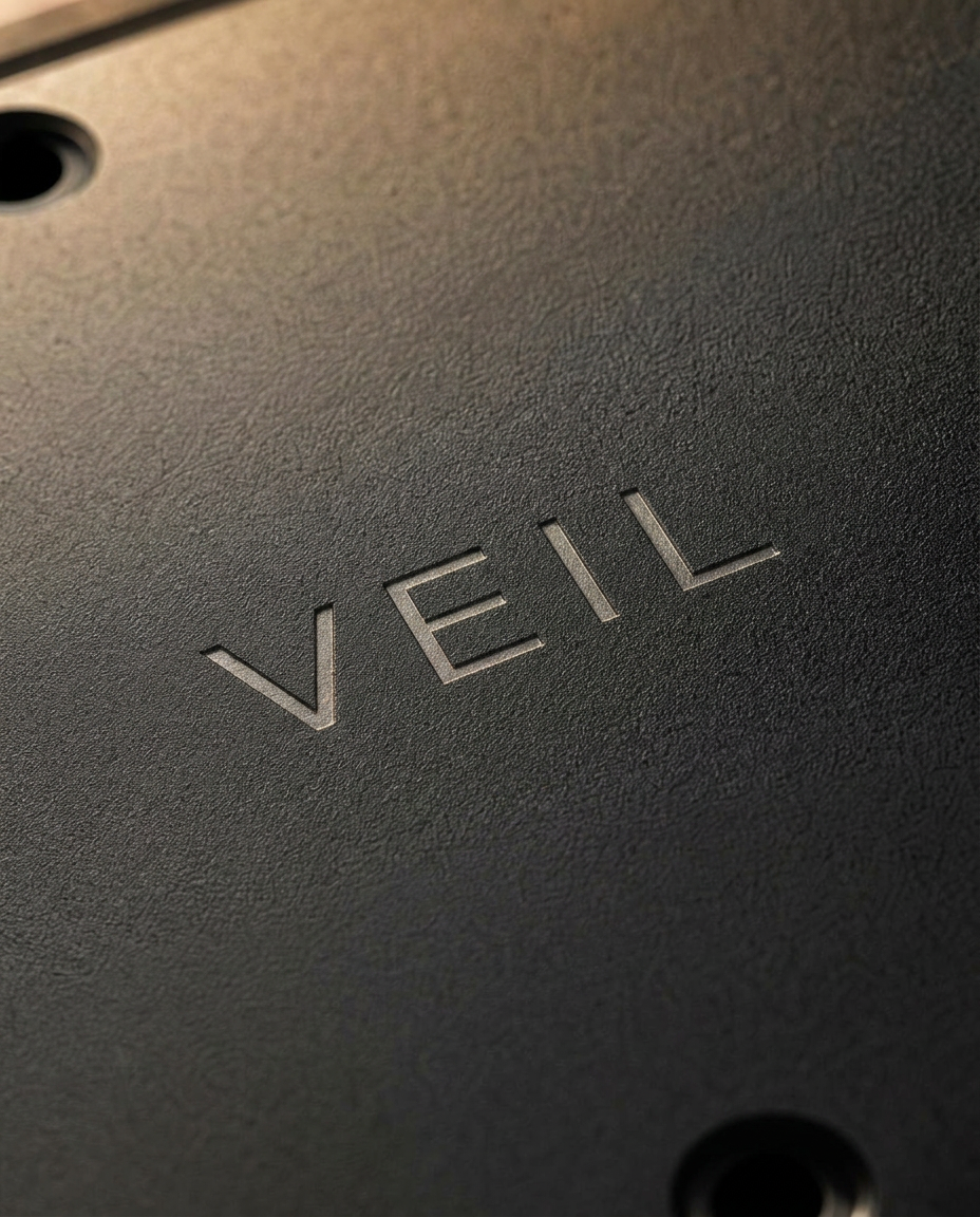 Macro of the laser-etched VEIL wordmark