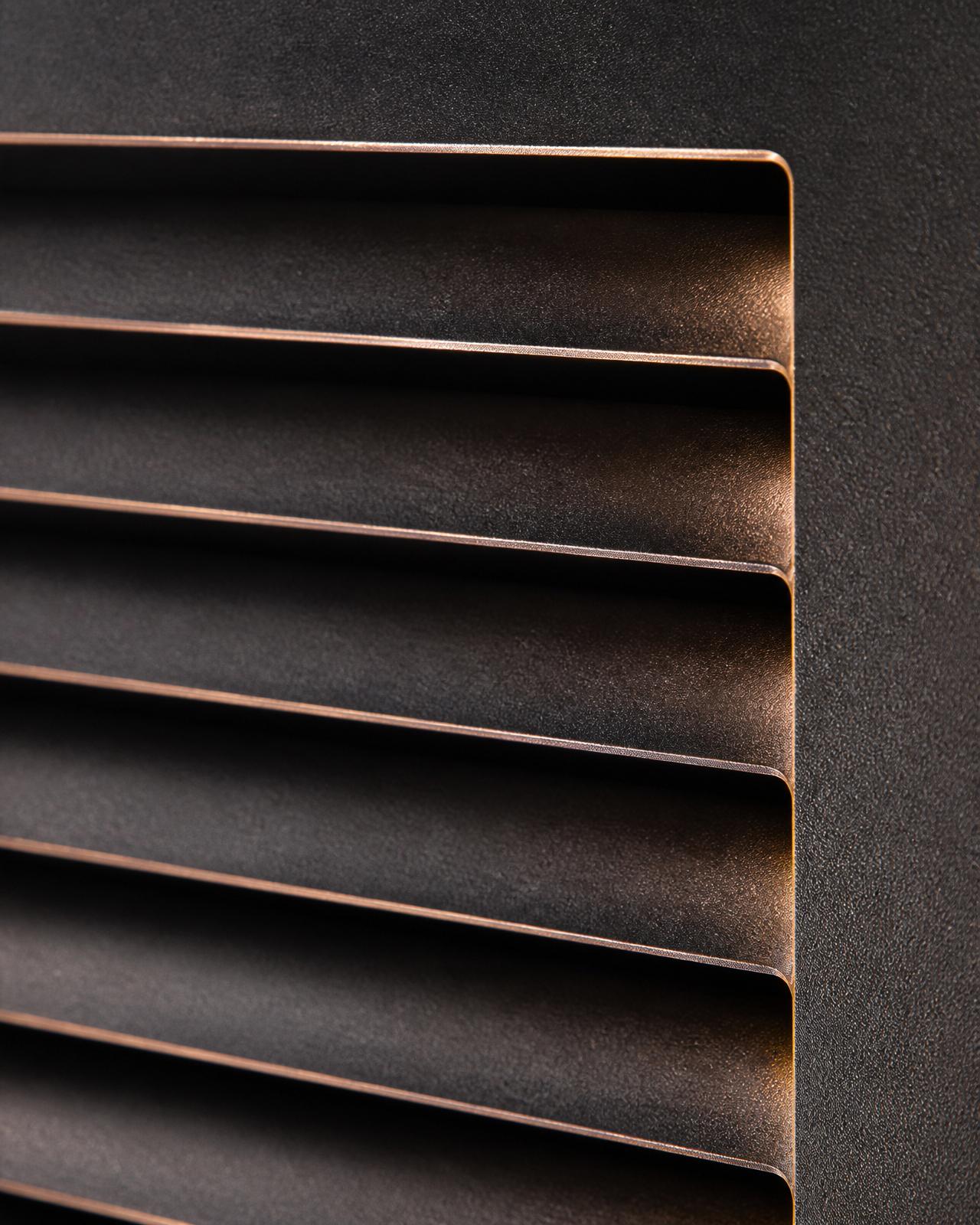 Macro of precision laser-cut horizontal louvers